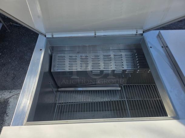 Continental SW72-30M 72″ commercial sandwich prep unit with stainless steel interior, open lid showing spacious compartment.