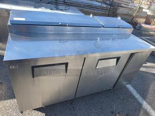 True TPP-67 two-door pizza prep table, stainless steel, excellent condition, with recessed handles, ideal for commercial kitchens.