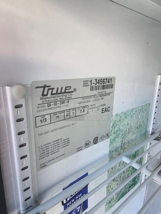 True QA-60-24M-B 60" Refrigerated Prep Table, model info and specs label. Features NSF certification.