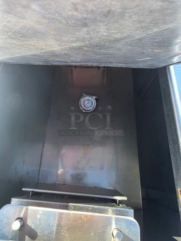 Delfield KCF-50 Ice Cream Counter interior, stainless steel, shows refrigeration mechanism, clean, well-maintained condition.