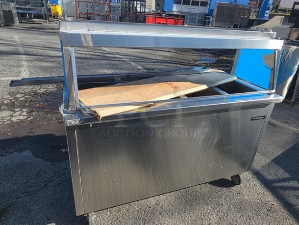 Delfield SH-4-NU 60" electric hot food serving counter, stainless steel, used condition, with overhead heat lamps.