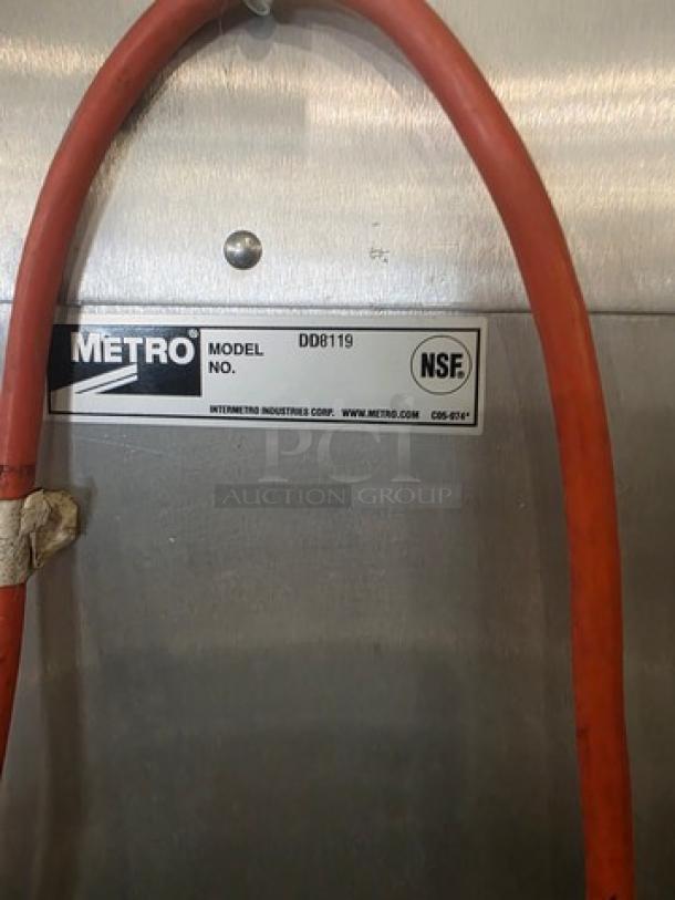 Metro DD8119 Transport Cabinet, stainless steel, NSF-certified, visible model label, sturdy construction.