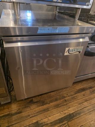 Avantco 178TUC27F 28" W undercounter freezer, stainless steel. Visible Avantco logo, sleek design, used condition.