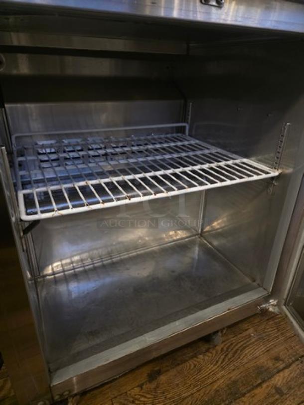 Avantco 178TUC27F 28" W undercounter freezer, stainless steel interior, adjustable shelf, used condition.