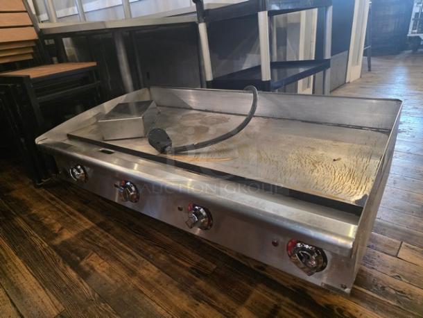 Star Max 48" electric griddle, 3-phase, stainless steel, four control knobs, used condition, power cord attached.