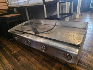 Star Max 48" electric griddle, 3-phase, stainless steel, four control knobs, used condition, power cord attached.