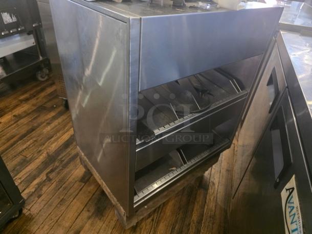 International Dairy Queen DD29 double level food warmer in stainless steel, used condition, with visible shelves for food storage.
