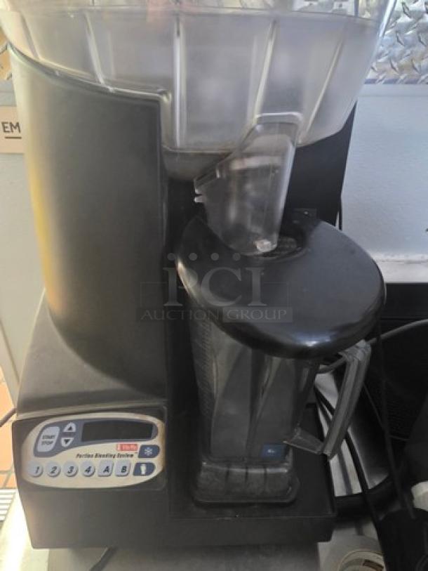 Vitamix VM0126 Portion Blending System Smoothie Bar Blender in good condition, featuring control panel and sturdy design.