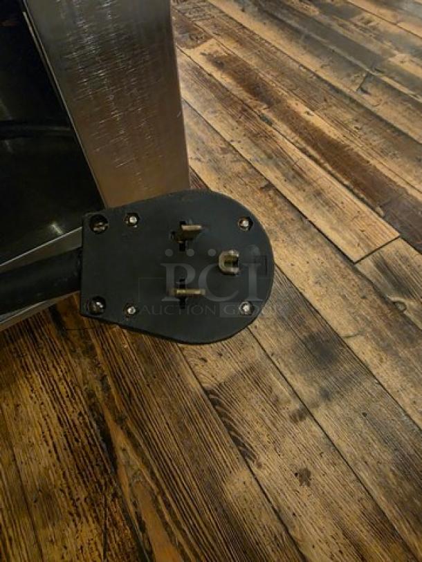 Custom 5 Well Steam Table in used condition, stainless steel finish, visible power plug, suitable for commercial use.