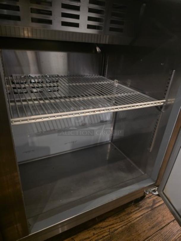 Avantco 178APT48HC 47" 2 Door Refrigerated Sandwich Prep Table, stainless steel, interior shelf, good condition.