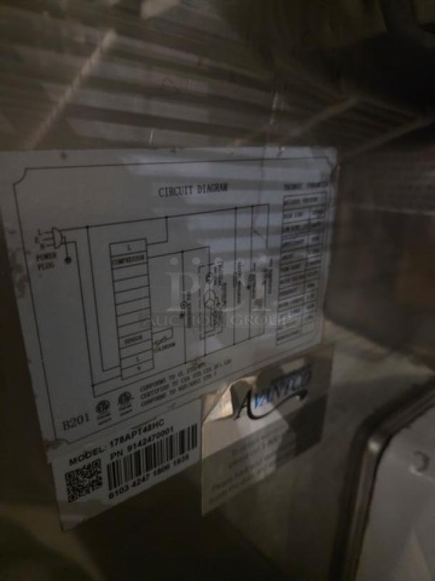 Alt text: Avantco 178APT48HC 47" 2 Door Refrigerated Sandwich Prep Table with circuit diagram label. Model and serial information visible.