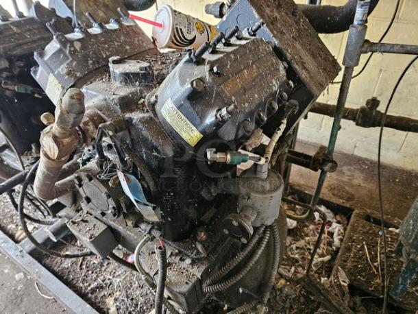 Commercial refrigeration compressor rack, medium temp, 404A, 40 HP. Condition shows wear and dirt. Buyer to remove with tools.