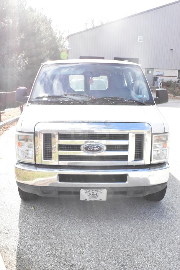 2012 Ford E-350 Van, white, 96,764 miles, 4 removable back seats, VIN 1FBSS3BL3CDA01043, good condition.