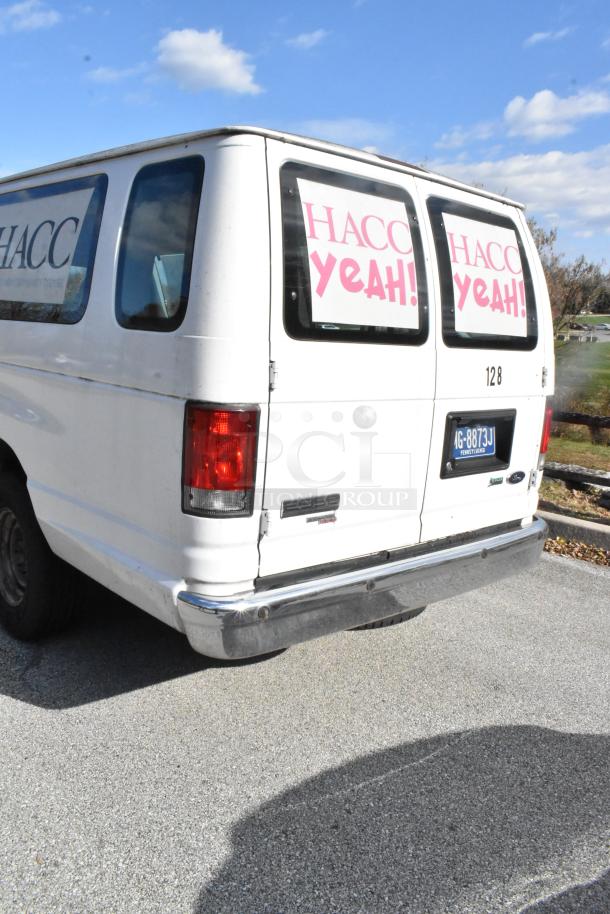 2012 Ford E-350 van with 4 removable back seats. Odometer reads 96,764 miles. VIN 1FBSS3BL3CDA01043. White exterior.