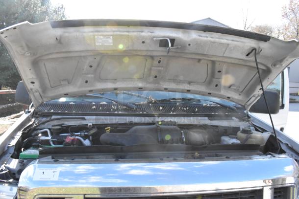 2012 Ford E-350 Van engine view, odometer 96,764 miles, includes four removable back seats, VIN 1FBSS3BL3CDA01043.