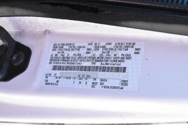 2012 Ford E-350 Van label showing VIN 1FBSS3BL3CDA01043, manufactured by Ford Motor Co, GVWR 4128 kg.