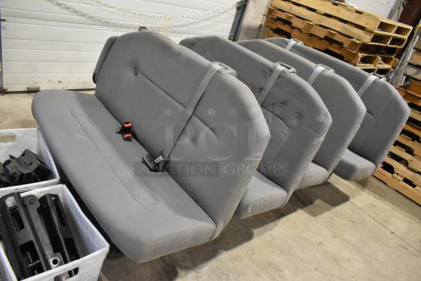 Removable back seats from a 2012 Ford E-350 Van, grey fabric, includes seat belts, good condition. Odometer: 96,764 miles.