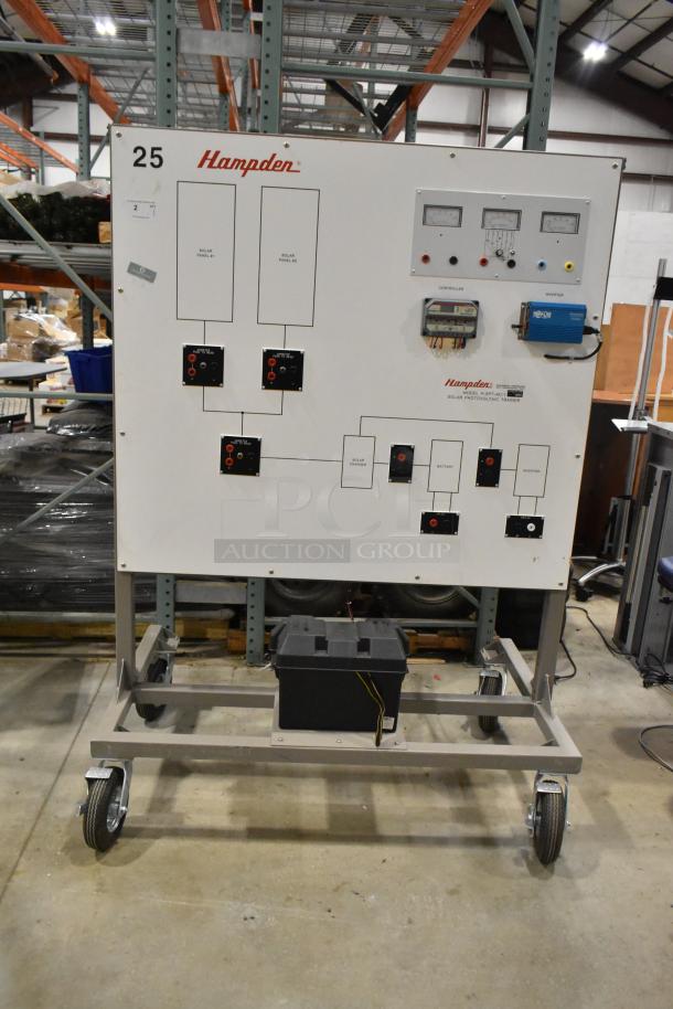 Kyocera solar panels on a Hampden controller, featuring input meters and switches. Mounted on a wheeled stand.