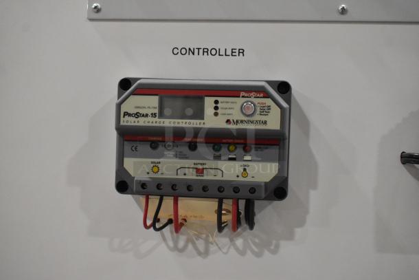 Morningstar ProStar-15 solar charge controller, PS-15M model, with wiring connections, mounted on labeled panel.