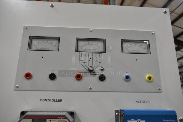 Kyocera solar panels on Hampden controller featuring DC volt, amp, and AC volt meters. Multiple connection ports visible.