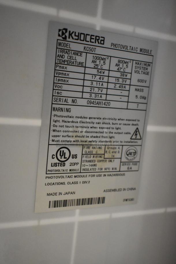 Kyocera KC50T solar panel label detailing model, specs, and warnings. Made in Japan, 54W, UL listed, for hazardous locations.