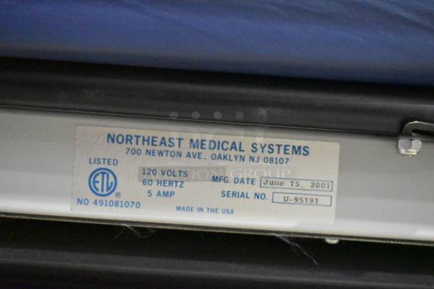 Northeast Medical Systems portable hospital bed label, 120 volts, 1 phase, made June 15, 2001, serial U-95191. Made in USA.