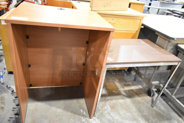 Two wood pattern items: a sturdy table with metal legs and a podium with cable cutout. Both are in good condition.