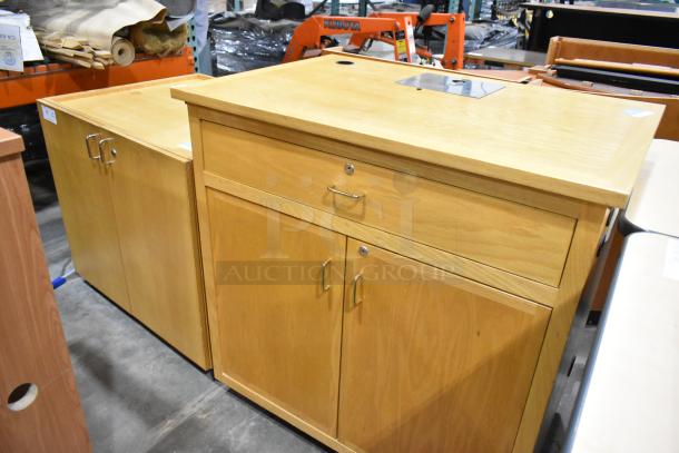 2 wood pattern cabinets; 1 with two doors, 1 with drawer and two doors. Sturdy build, slight wear, silver handles.