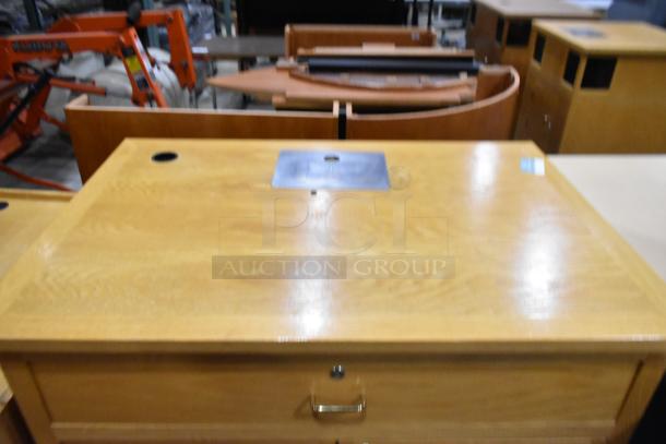 Two wood pattern cabinets; one with two doors, one with a drawer and two doors. Features metal handle and smooth finish.