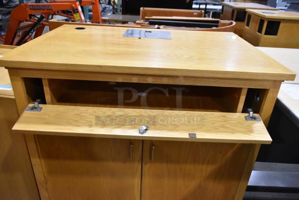 Two wood pattern cabinets, one with two doors and one with a drawer and two doors. Both in good condition, showing natural grain.