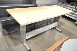 Wood Pattern Desk with light wood finish, metal legs, and cable management hole. In good condition, ideal for office use.