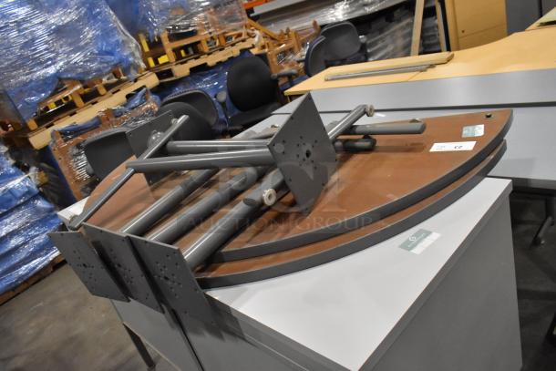 Metal 2-door cabinet and disassembled tabletop with legs. Multiple sets available. Markings visible on the cabinet.