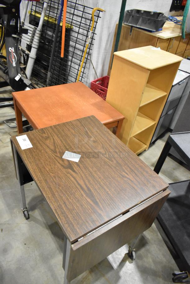 Three wood-pattern furniture pieces: a desk on casters, a square table, and a three-shelf bookcase. Each has a distinct wood finish.