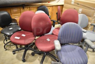 10 assorted office chairs on casters, various colors and conditions. Perfect for bulk purchase, no visible brand tags.