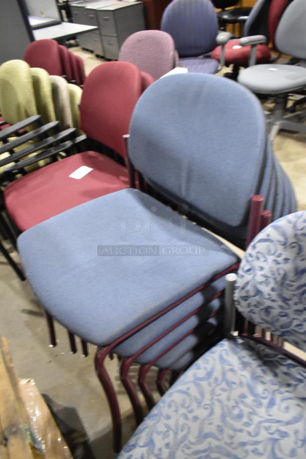 28 assorted chairs with varied colors and styles. Used condition. Includes stacking and cushioned chairs. Multiple fabric patterns.