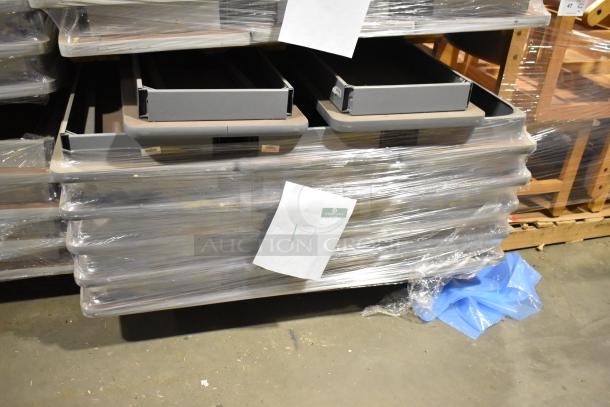 Stack of 29 gray folding tables wrapped in plastic, gently used condition, paper label marked "17" attached.