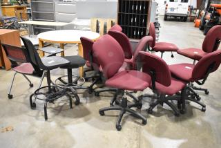 Twelve assorted office chairs, including maroon chairs with casters, in used condition. Includes bid for all chairs.