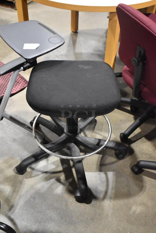 12 assorted chairs, some with casters, mixed conditions, auction lot. Features include fabric upholstery, adjustable bases.