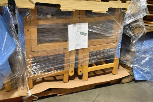 16 wood pattern chairs, wrapped and labeled, in new condition. Auction lot offers 16 chairs per bid.