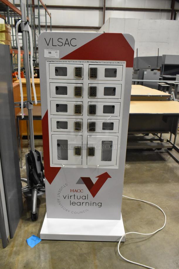 Metal 10 cubby filing cabinet with combination lock for each cubby, in good condition, marked "HACC Virtual Learning".