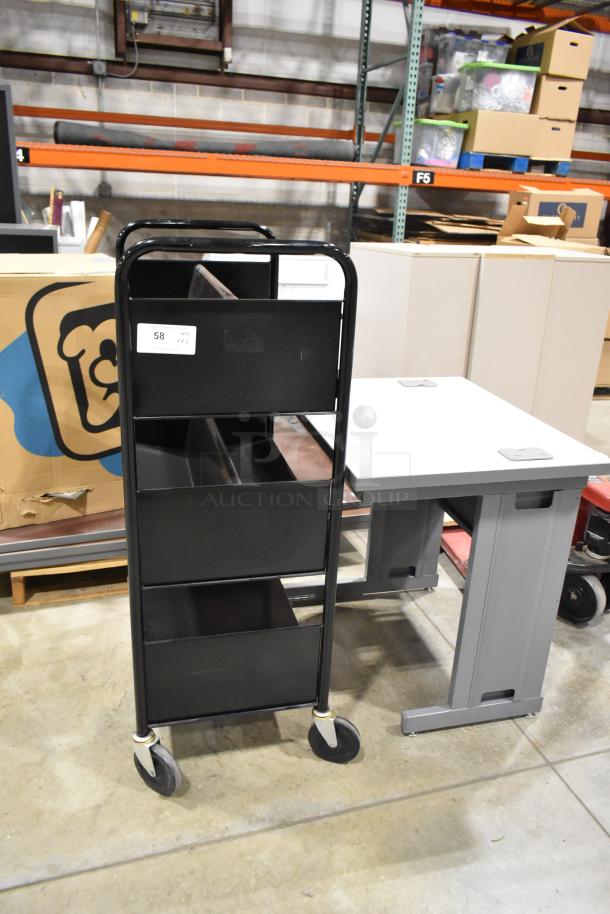Black 3-tier cart on casters and gray desk, both in good condition. Cart label reads: "58 G17 1/2".