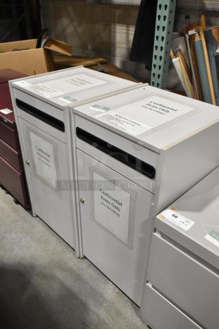 Two white drop cabinets for shredding documents, labeled “Confidential Items Only.” Sturdy, secure design in good condition.