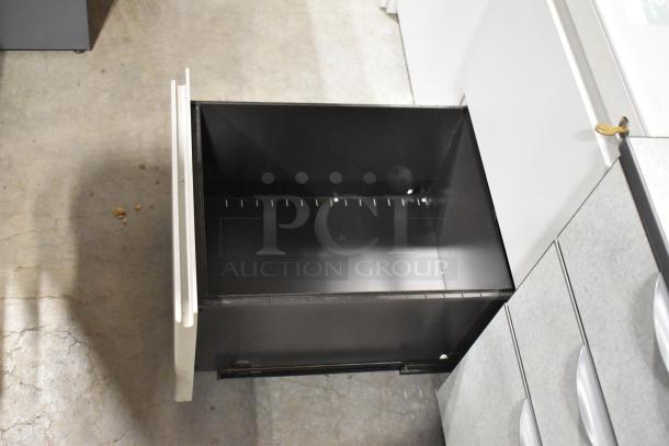 Two filing cabinets, one 2-drawer and one 3-drawer, light gray, metal, used; drawers open smoothly. Auction: 2 times your bid.