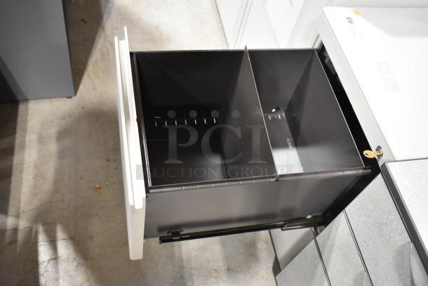 Two filing cabinets, one with 2 drawers, one with 3 drawers, shown open. Use includes office storage. Good condition.