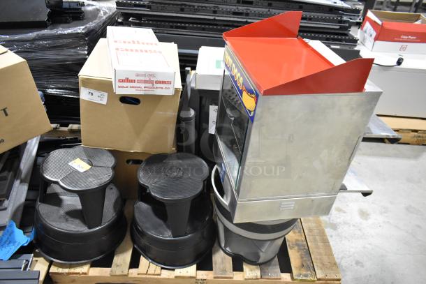 Pallet lot with stools, test tube holders, TV, and a metal hot dog merchandiser. Various boxes, good condition.