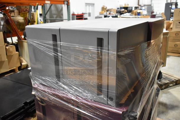 6 maroon and gray metal filing drawers, including 3-drawer and 2-drawer units, wrapped for auction.