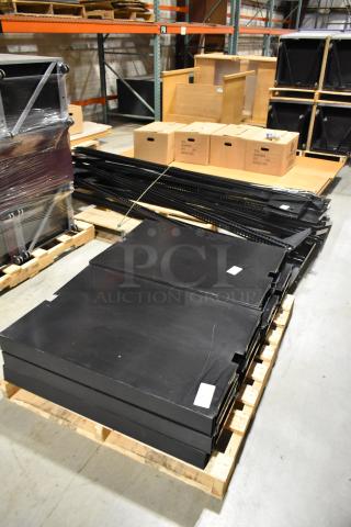 Three pallets of metal pieces for racking, varying shapes and sizes, stored in a warehouse. Tags indicate lot numbers.