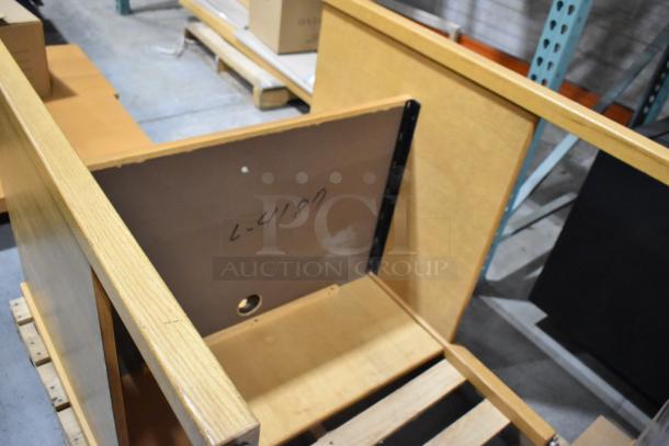 Wood pattern desk frame, partially assembled, light wood finish. Visible marking "L-4187" on rear panel. Good condition.