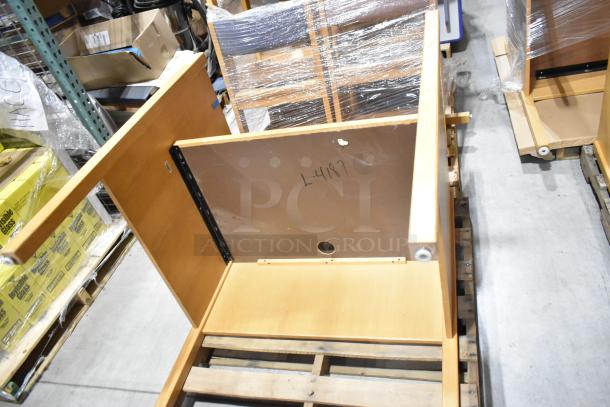 Wood pattern desk, partially disassembled, good condition. Marked "L-4187." Suitable for home or office setup.