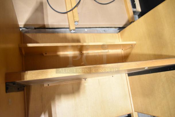 Wood Pattern Desk; natural wood finish, shelving visible, sturdy condition, ideal for home office use.